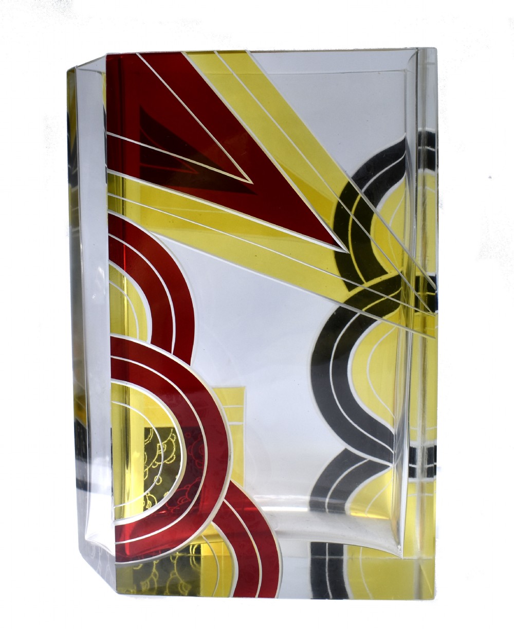A rectangular clear glass Art Deco vase decorated with etched patterns and enamelled geometric shapes in black, yellow, and red. View VIII