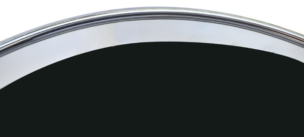 A circular Art Deco occasional table featuring a reflective chrome tubular metal frame and a black and clear glass top. View IV