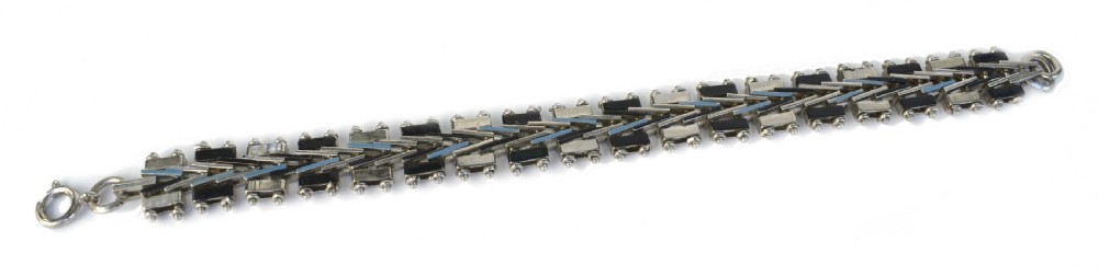 An Art Deco chrome-plated link bracelet featuring geometric black and light blue enamel accents in a machine-age pattern. View II
