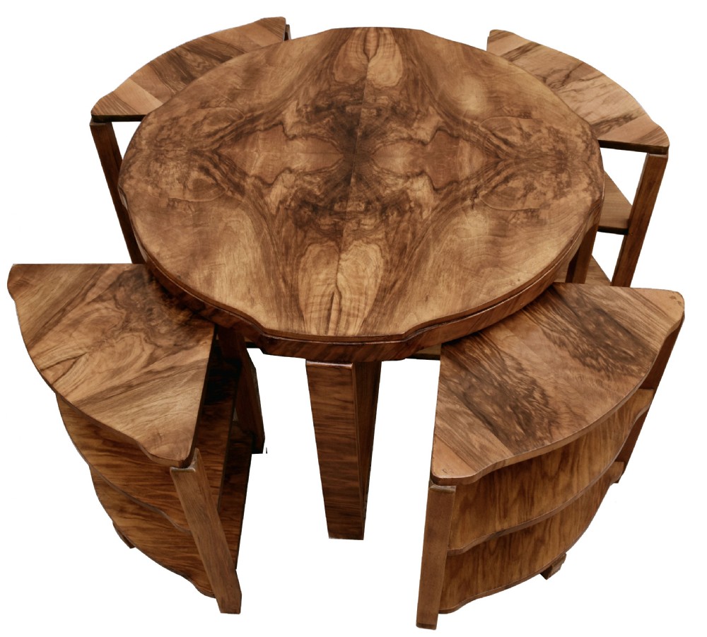 An Art Deco circular walnut coffee table housing four matching triangular side tables beneath its top. View III
