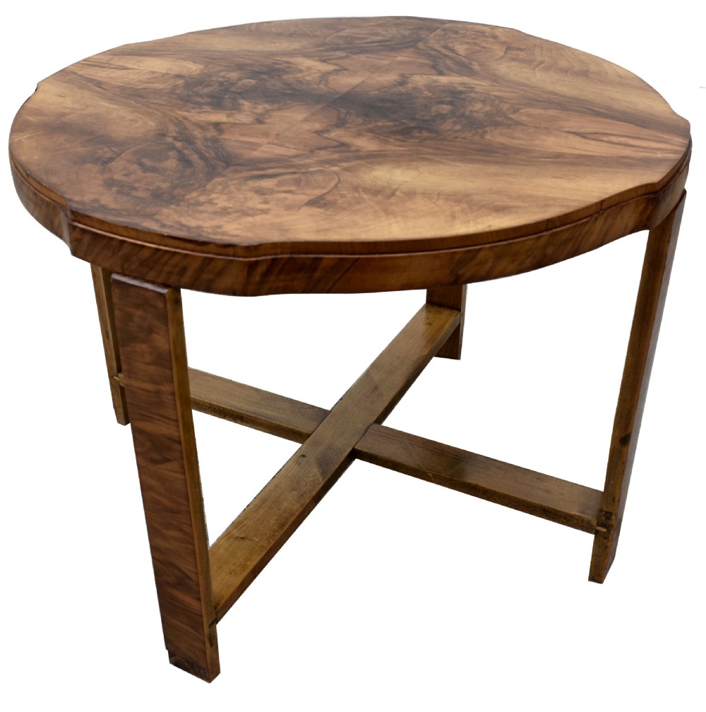 An Art Deco circular walnut coffee table housing four matching triangular side tables beneath its top. View V