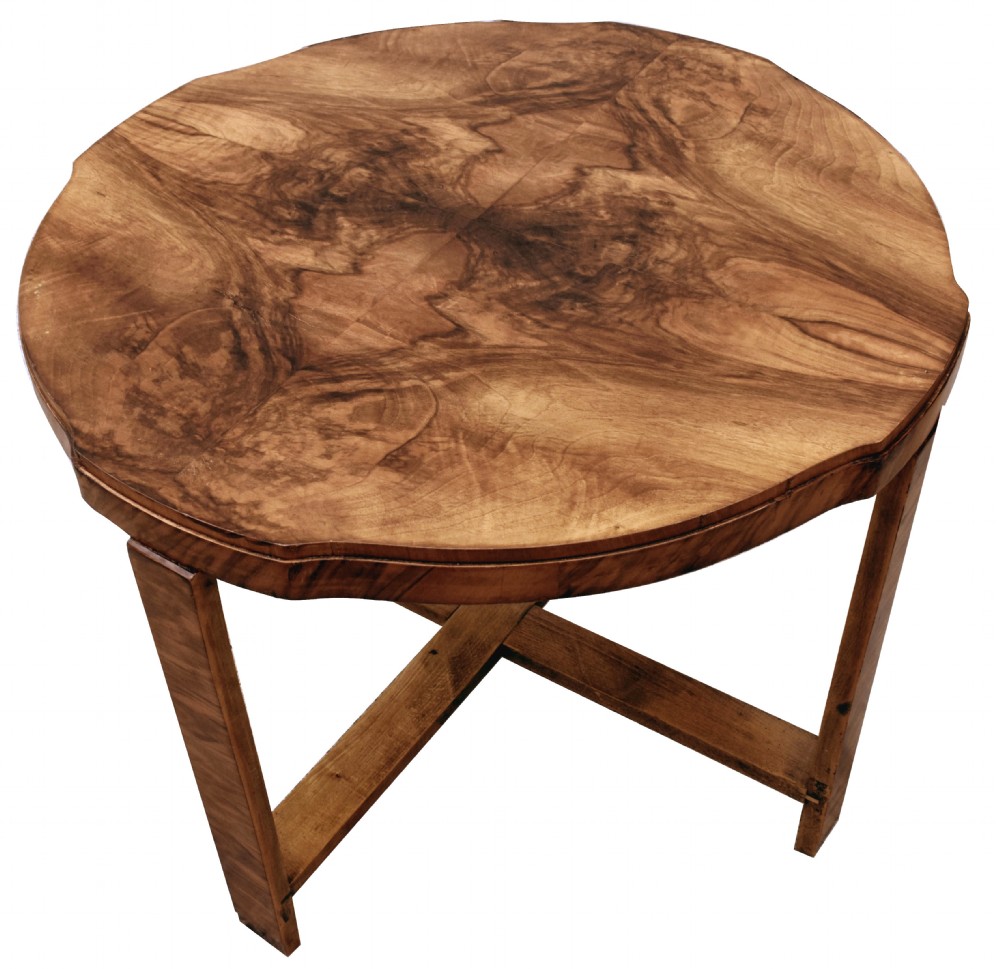 An Art Deco circular walnut coffee table housing four matching triangular side tables beneath its top. View VI