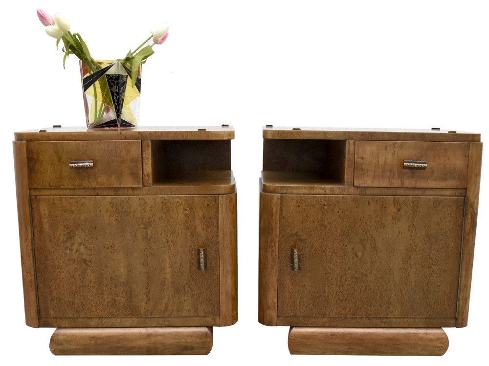 A matching pair of 1930s Art Deco burr elm bedside cabinets featuring top drawers, open compartments, single-door cupboards, and rounded plinth bases. View XIV