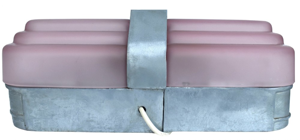 An Art Deco style lamp featuring a stepped pink frosted glass body decorated with black silhouetted figures dining inside windows, framed by a silver-coloured cast metal base and central architectural doorway with a clock motif. View IX