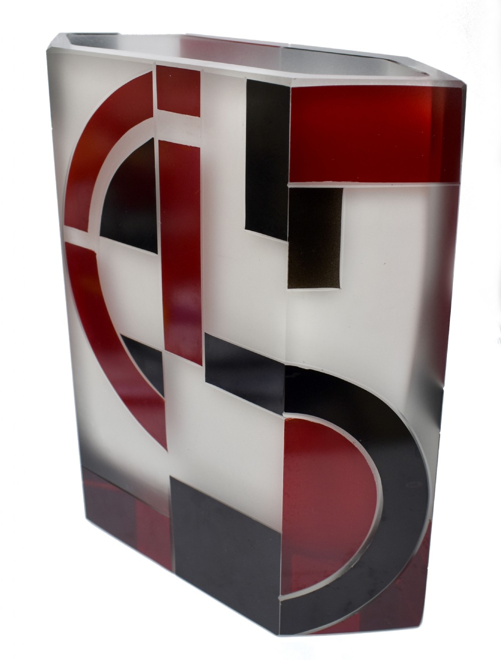 An Art Deco hexagonal opaque glass vase featuring bold red and black geometric enamel motifs. View III