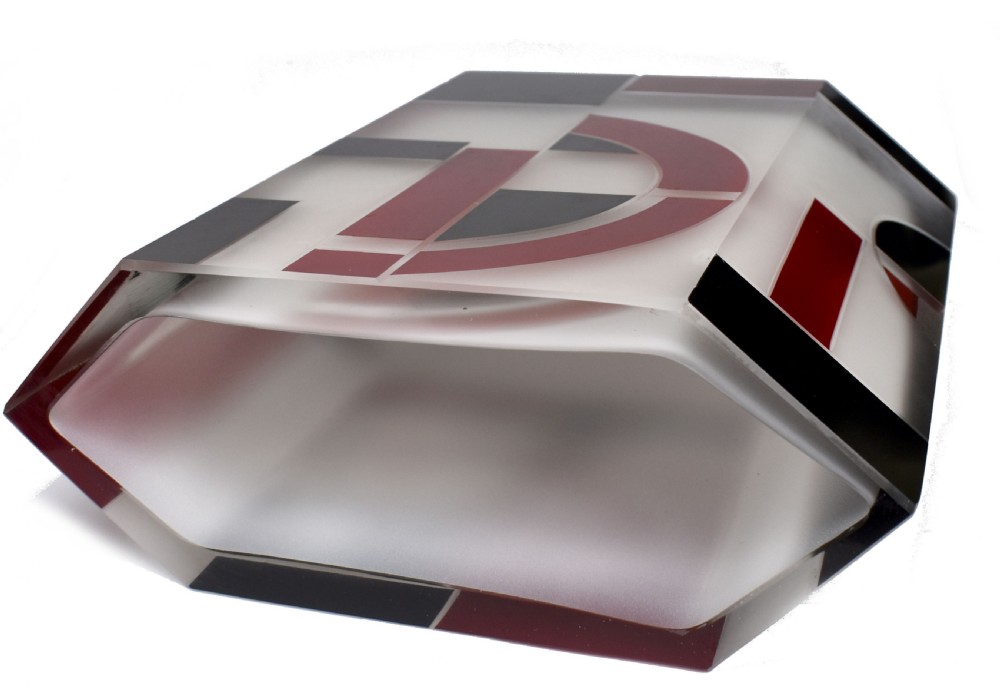 An Art Deco hexagonal opaque glass vase featuring bold red and black geometric enamel motifs. View VIII