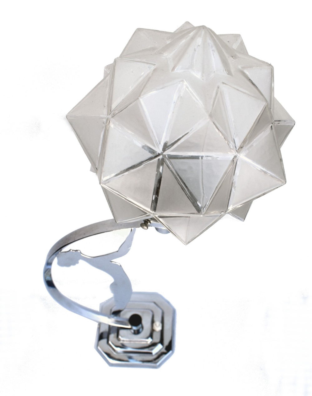 An Art Deco chrome table lamp featuring a stylised female dancer figure holding aloft a frosted geometric glass shade on a stepped base. View II