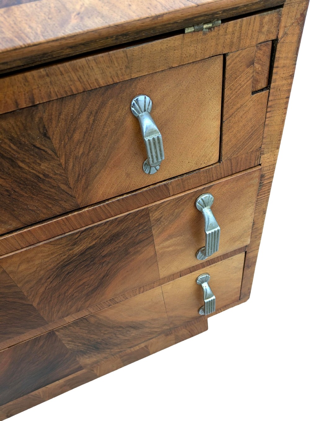 An Art Deco walnut upright bureau bookcase featuring a two-door glazed upper display cabinet above a slope-front writing slope and three drawers. View XI