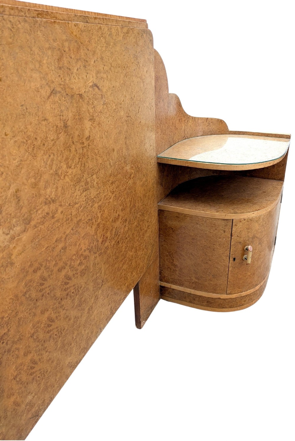 An Art Deco blonde maple headboard featuring a stepped Odeon design with integrated curved bedside cabinets on either side. View VIII