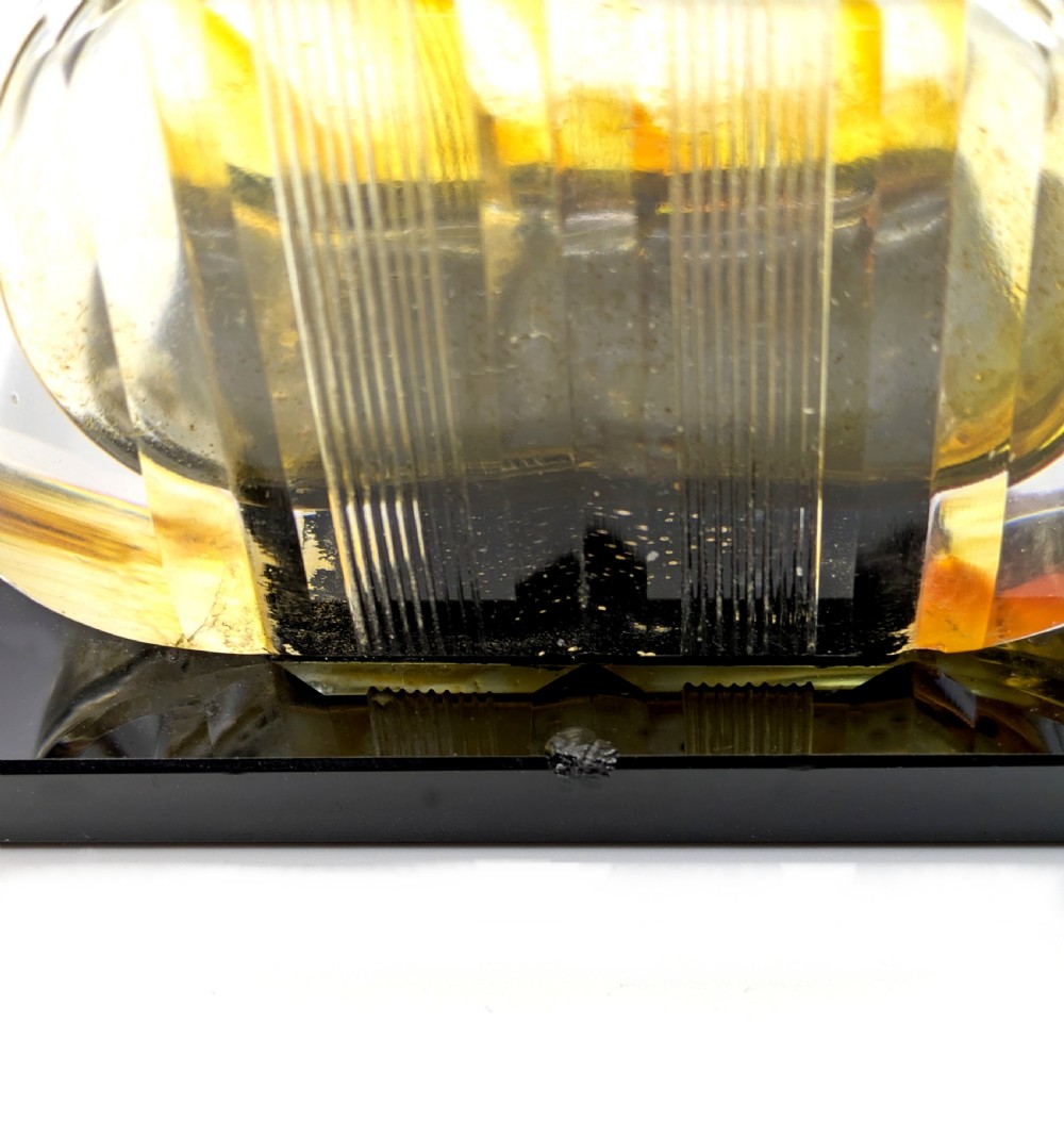A French Art Deco cut glass perfume atomiser featuring a silver-toned metal spray mechanism mounted on a flat black rectangular base. View VIII