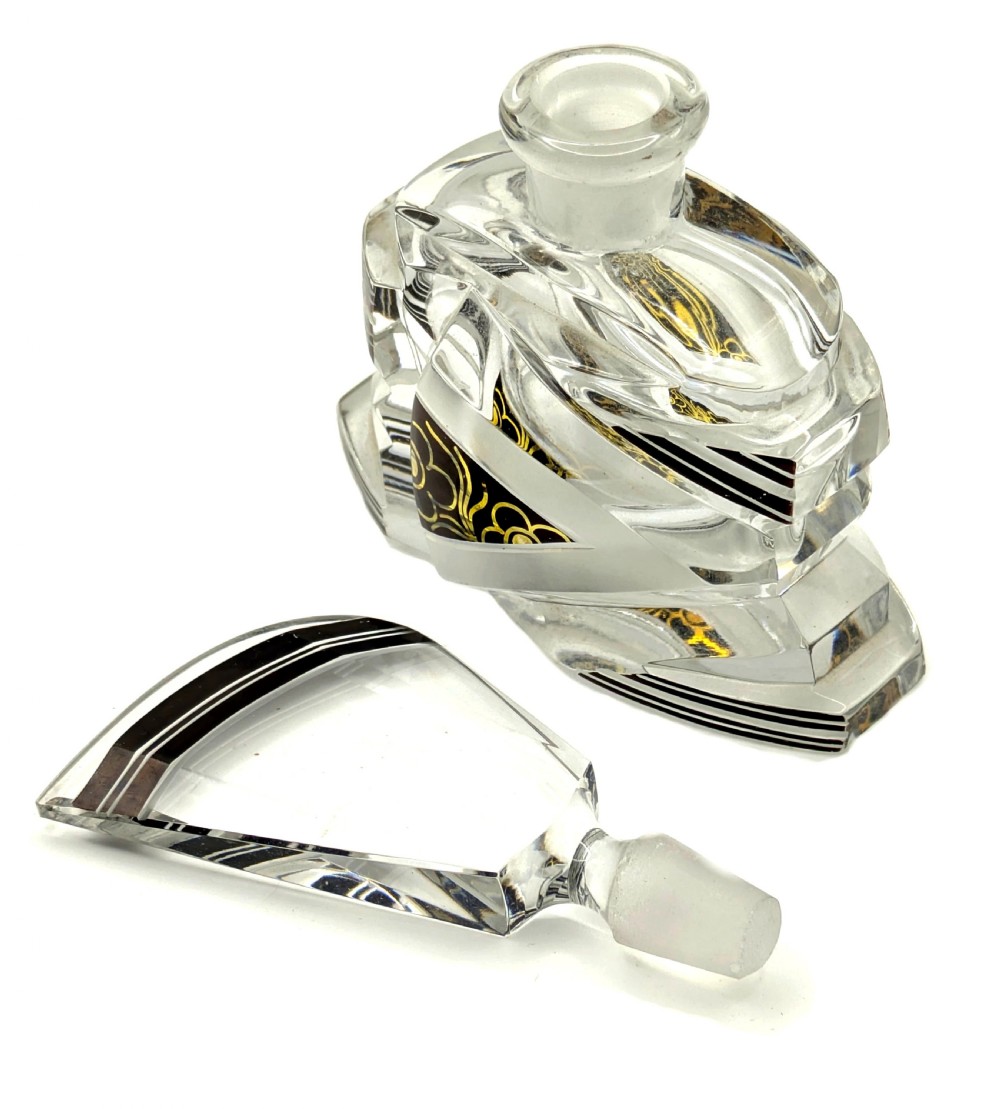 Geometric Art Deco clear glass perfume bottle with black enamel stripes, gold detailing, and a fan-shaped glass stopper. View IV