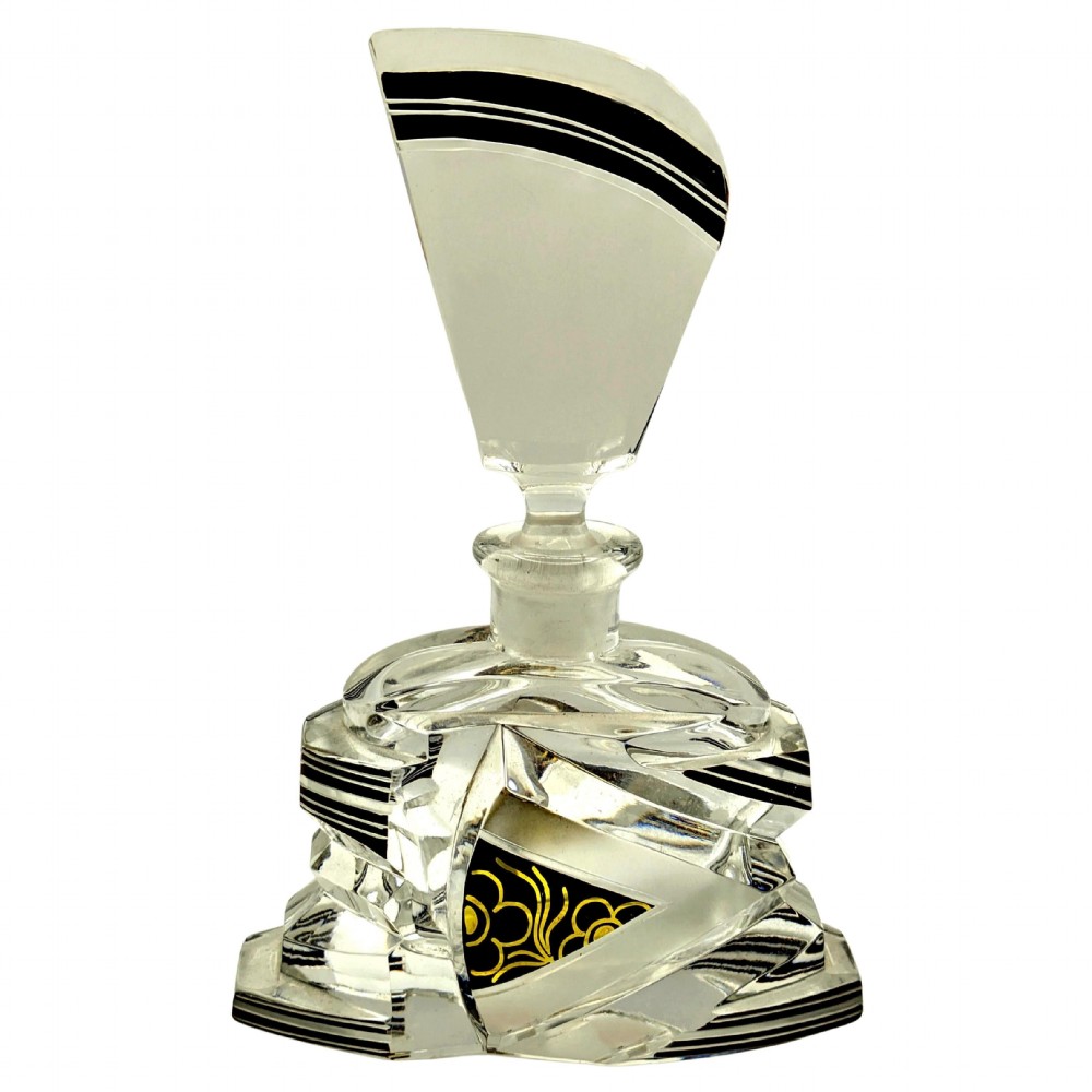 Geometric Art Deco clear glass perfume bottle with black enamel stripes, gold detailing, and a fan-shaped glass stopper.