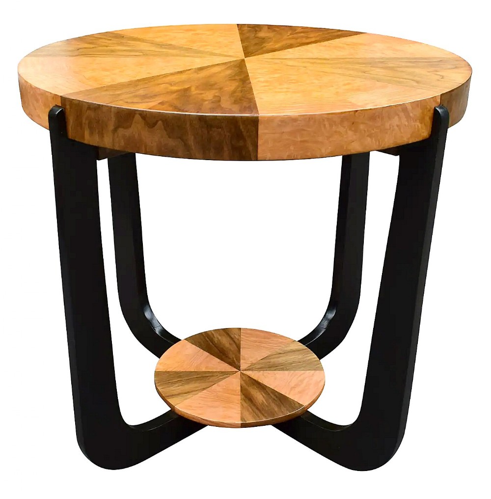 A circular Art Deco occasional table featuring a two-tone sunburst veneered top in walnut and maple with ebonised curved legs.