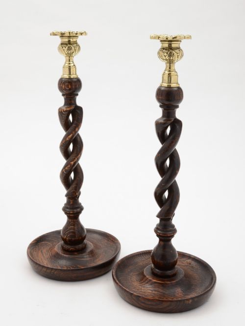 Pair of English Edwardian Oak, Open Barley Twist Candlesticks