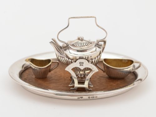 fig 1. Miniature Silver Tea Set on Oak and Silver Tray