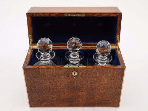 Victorian Oak Cased Three Bottle Tantalus, Circa 1880