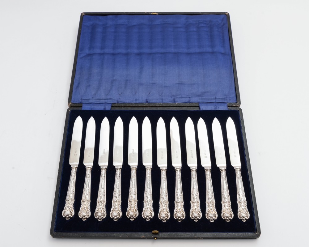 Boxed set of 12 Silver Handled fruit knives.