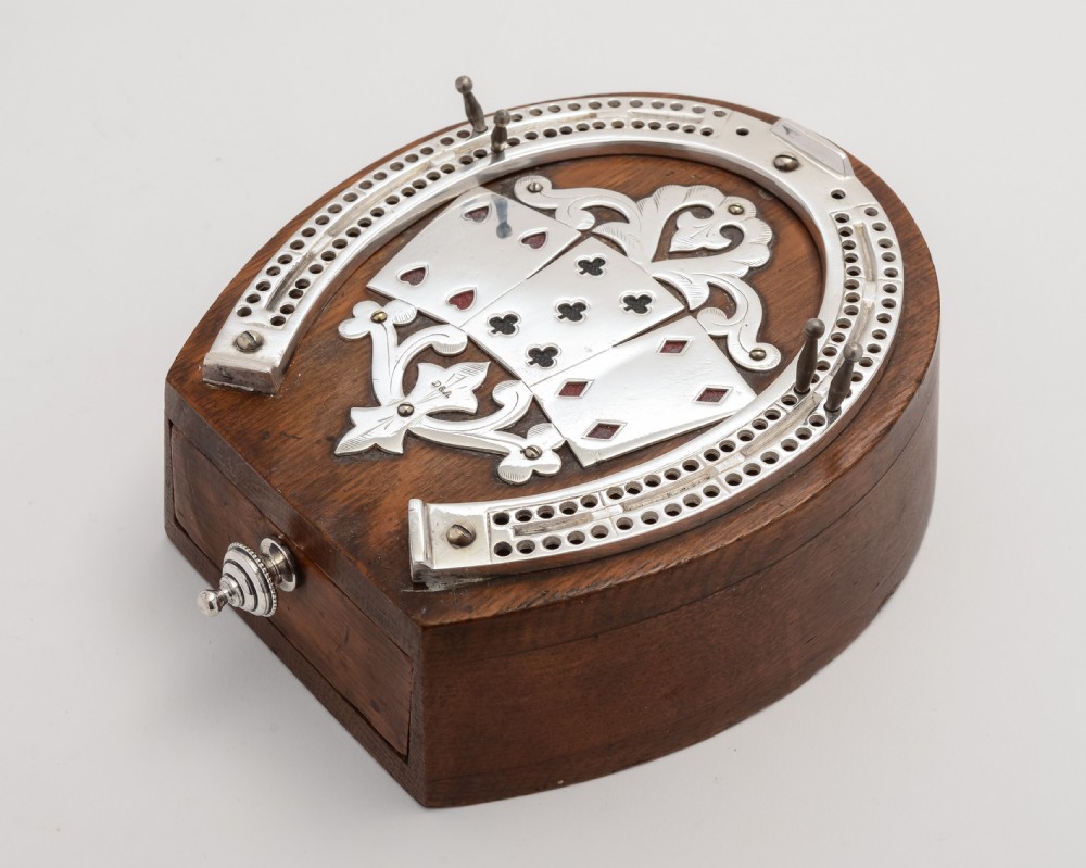 Lovely Victorian Horse shoe shaped cribbage board by Daniel & Arter