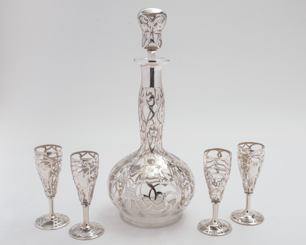 Silver Overlaid Decanter & Matching Glasses.