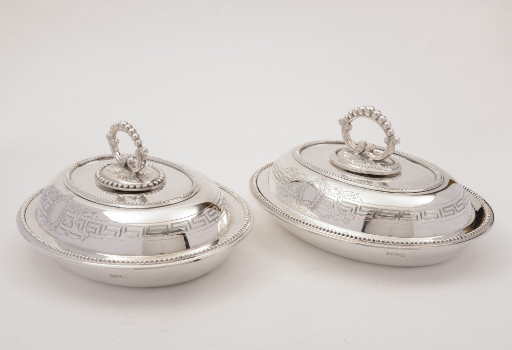 A matched pair of Victorian silver plated entrée dishes by Hukin & Heath, circa 1890