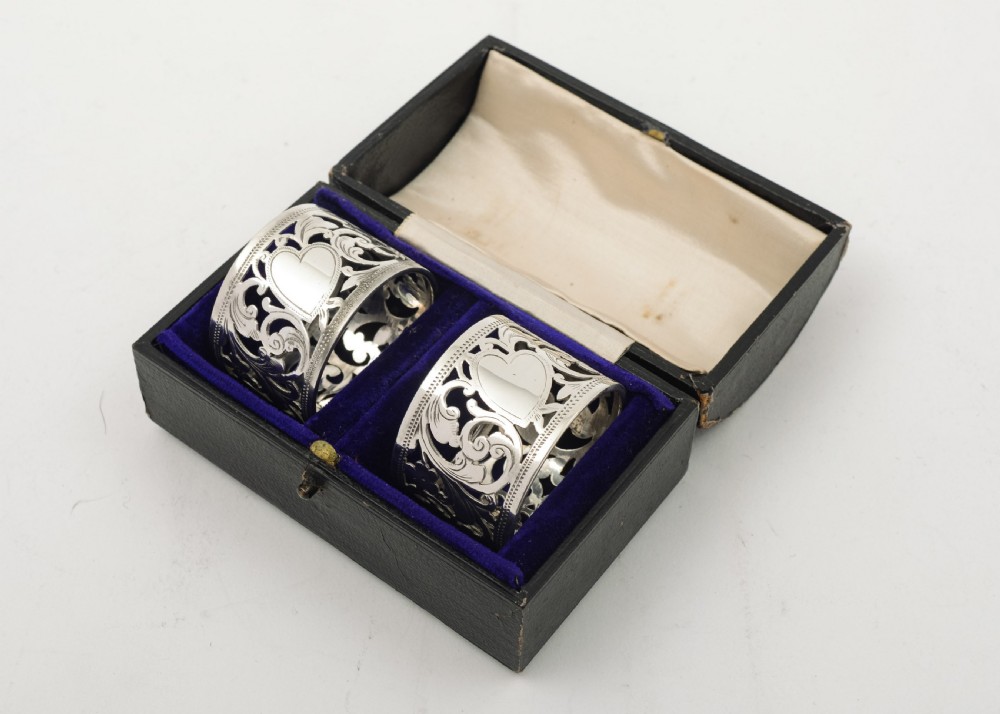 Gorgeous cased pair Victorian silver napkin rings. Birmingham 1899