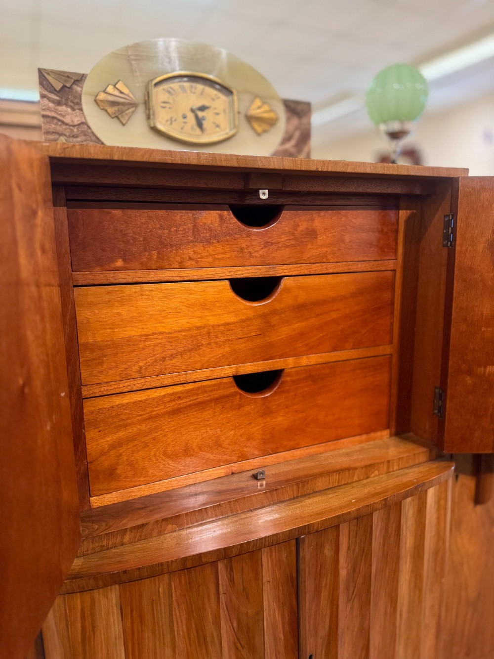 An Art Deco walnut sideboard featuring a stepped silhouette, fluted central cabinet doors, and figured veneer panels. View II