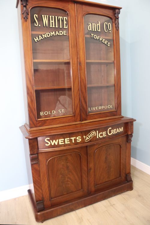 A Fabulous Victorian Mahogany Bookcase Cabinet Formed of Two Sections.