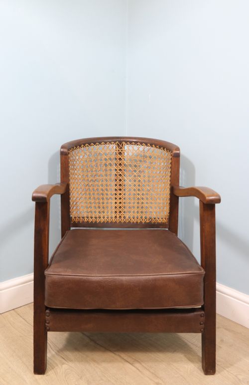 Early 20th Century Small Beech Framed Cane Back Bergère Chair.