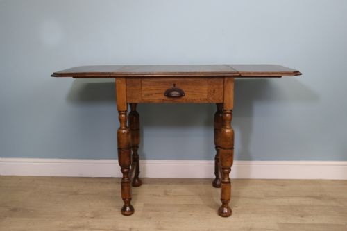 A Lovely Solid Oak Drop Leaf Dining Side Dating from the 1920’S / 30’S