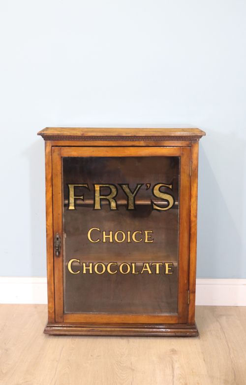 Edwardian Hardwood Single Door Display Cabinet with 24ct Gold Leaf for Fry’s Choice Chocolate.