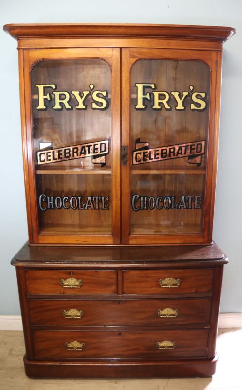 A Lovely Antique Mahogany Advertising Cabinet.