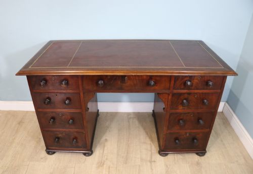 Lovely Flame Mahogany Veneered Twin Pedestal Desk Has a Tooled Leather Writing Surface