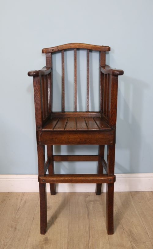 A Lovely Early 20th Century Oak Highchair.