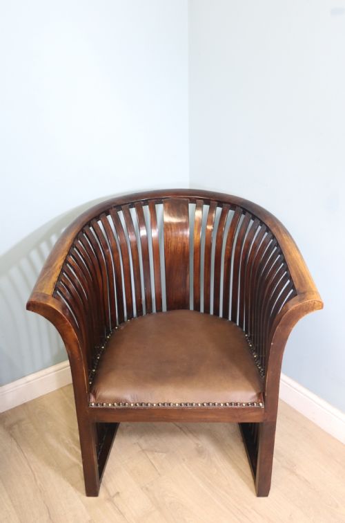 An Early 20th Century Hardwood Framed Chair with Curved Back