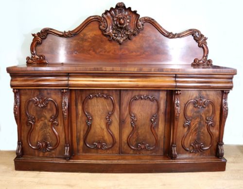 A Superb Antique Mahogany Sideboard of Large Proportions.