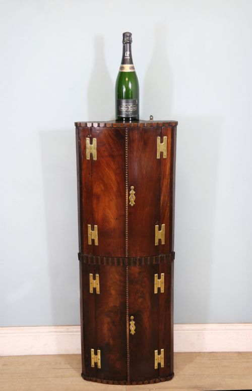 A Lovely & Extremely Unusual Georgian Bow Front Four Door Corner Cabinet.