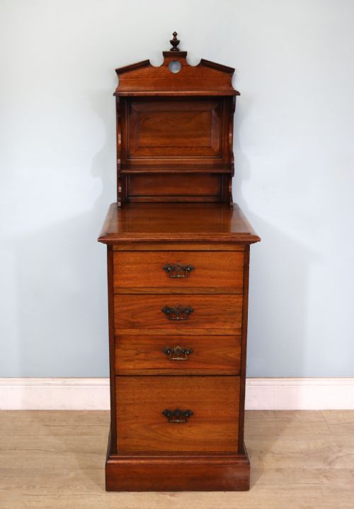 A Late 19th Century American Walnut Pedestal Chest.