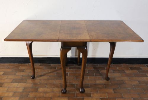 A Lovely Queen Anne Revival Drop Leaf Dining Table.