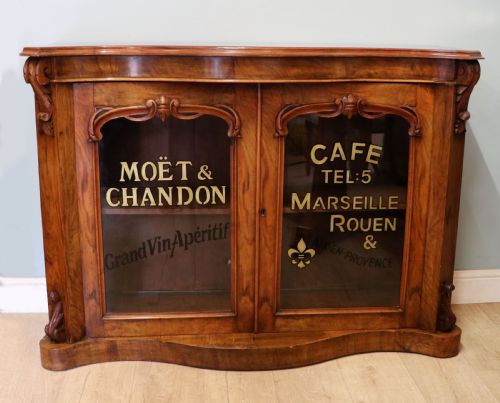 A Lovely Victorian Walnut & Mahogany Veneered Sideboard of Serpentine Form.