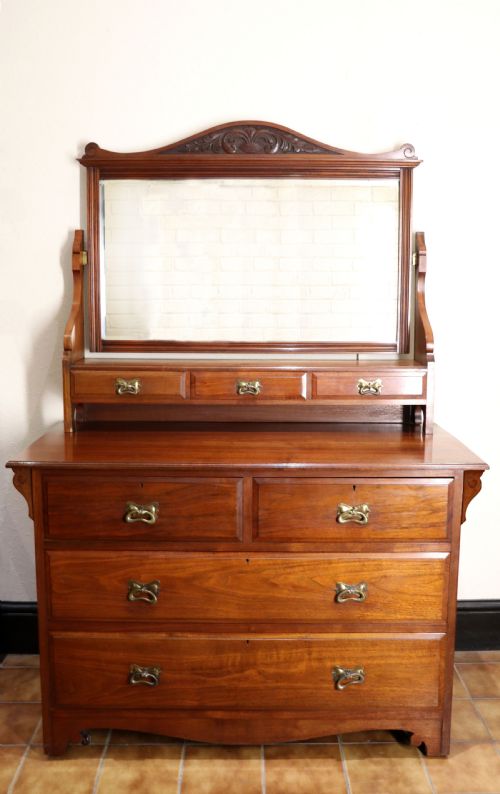 A Late Victorian American Walnut Dressing Chest.