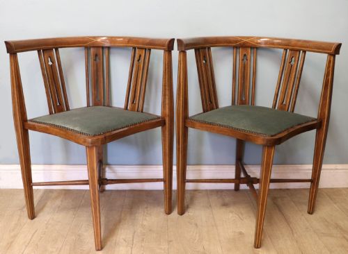 A FANTASTIC VERY RARE PAIR OF CORNER CHAIRS