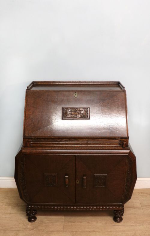 A MOST UNUSUALLY CONFIGURED OAK VENEERED BUREAU - ADDITIONAL PHOTO 2