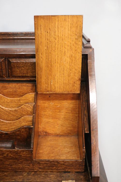 A MOST UNUSUALLY CONFIGURED OAK VENEERED BUREAU - ADDITIONAL PHOTO 27
