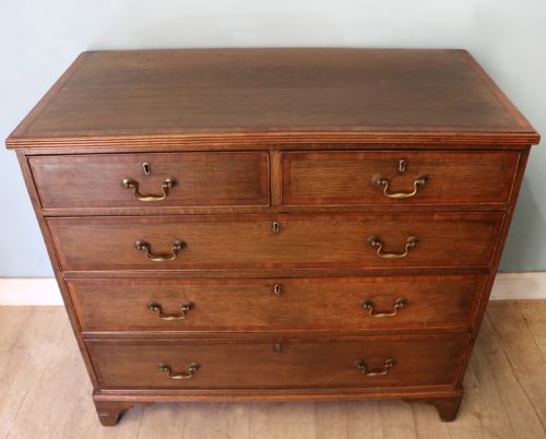 A Lovely Understated George III Oak and Mahogany Crossbanded Chest of Drawers.