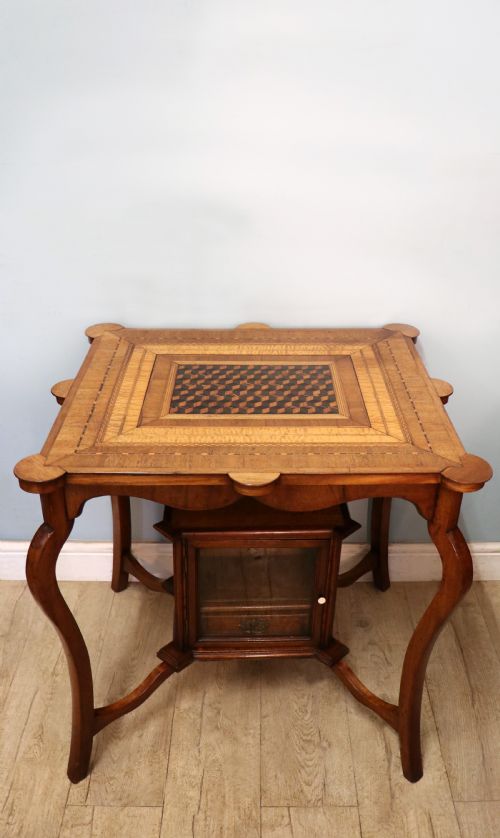 A MOST STRIKING LATE VICTORIAN COMBINATION INLAID TABLE AND SMOKERS CABINET