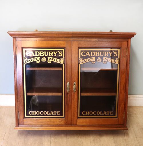 A Superb Late Victorian Walnut Framed Wall Cabinet, Later Sign Written for Cadbury Chocolate.