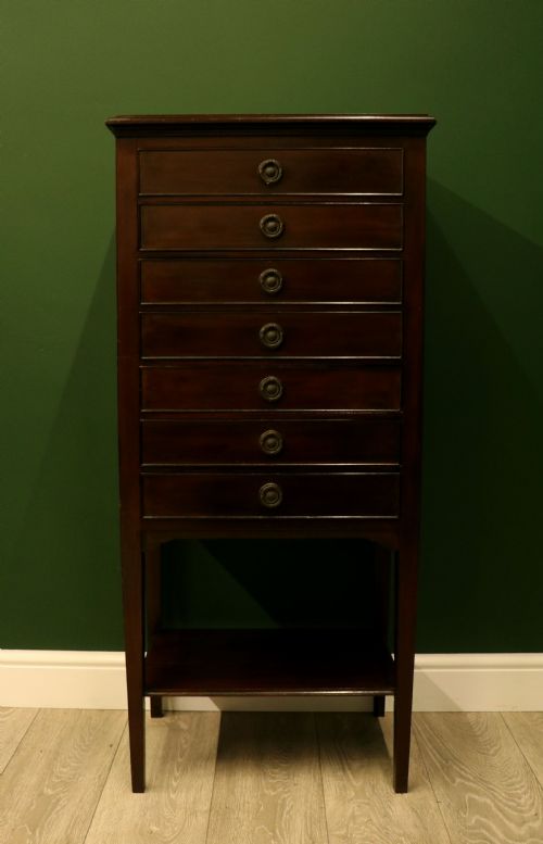 AN EARLY 20TH CENTURY MAHOGANY MUSIC CABINET