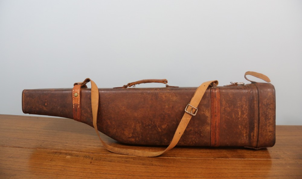A good quality late 19th or early 20th century leather 'leg of mutton' gun case  View IV