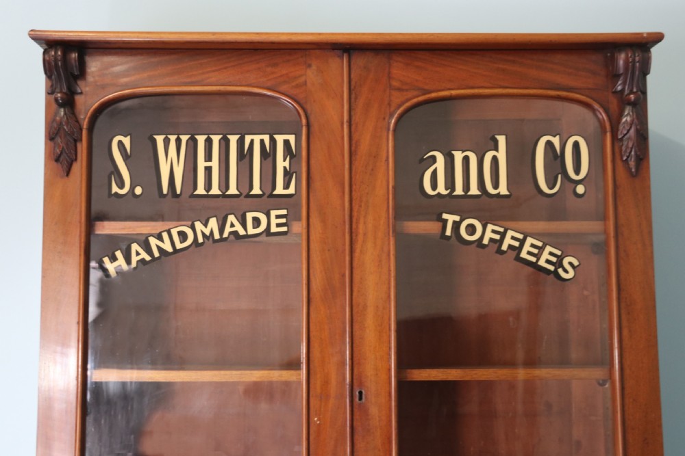 A fabulous Victorian mahogany bookcase cabinet formed of two sections.  View V