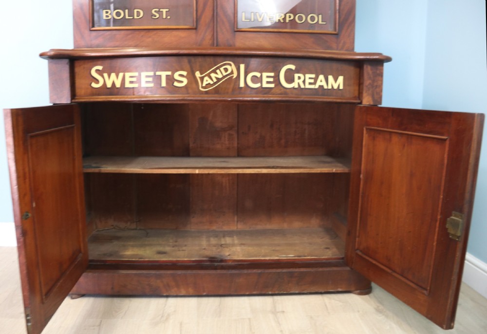 A fabulous Victorian mahogany bookcase cabinet formed of two sections.  View VII